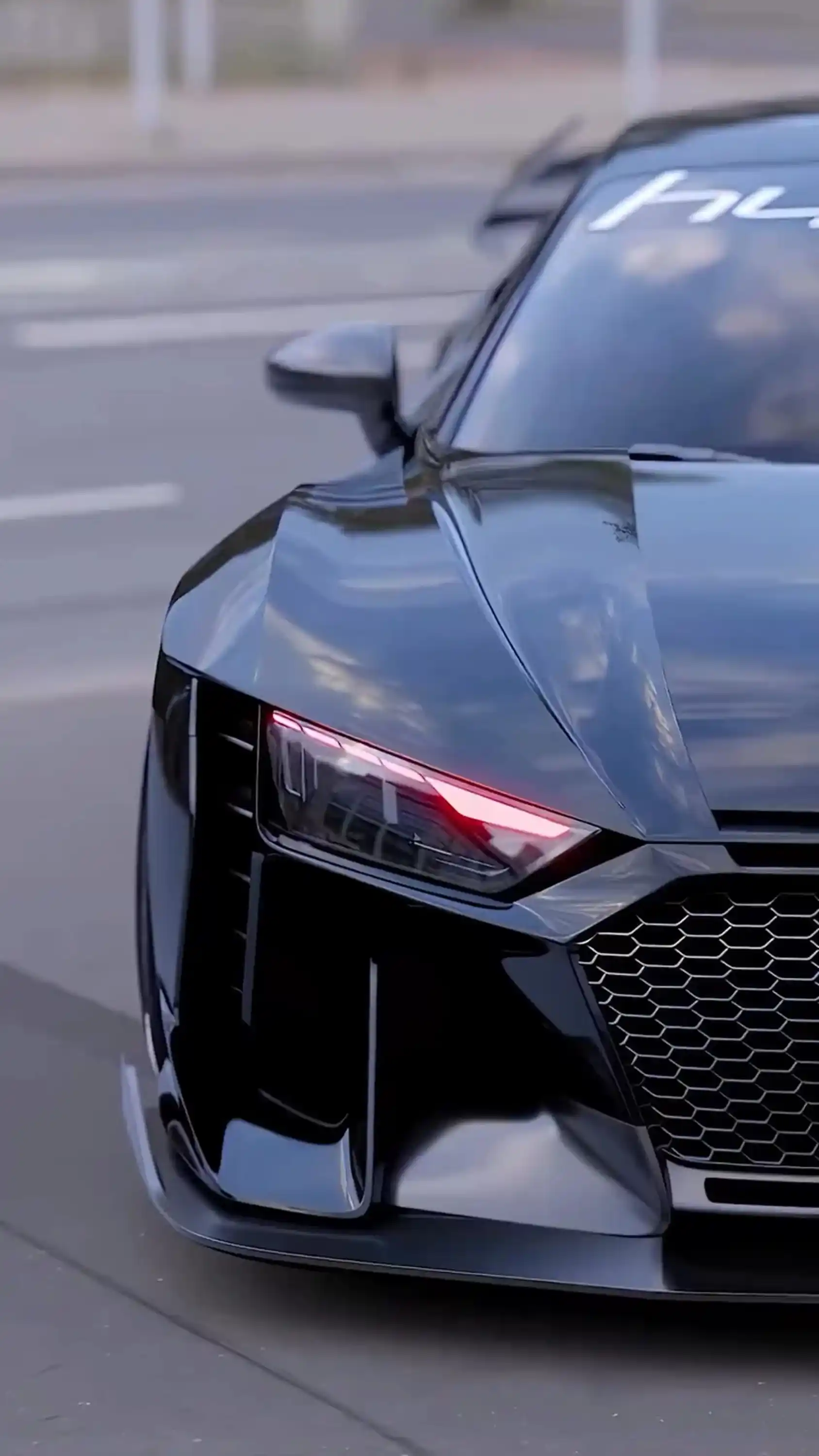 Luxury Sports Car in Neon City - Night Racing Wallpaper